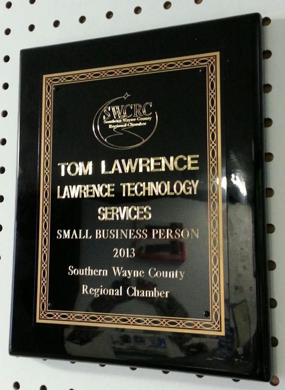 Plaque reading: Tom Lawrence, Lawrence Technology Services, Small Business Person 2013, Southern Wayne County Regional Chamber